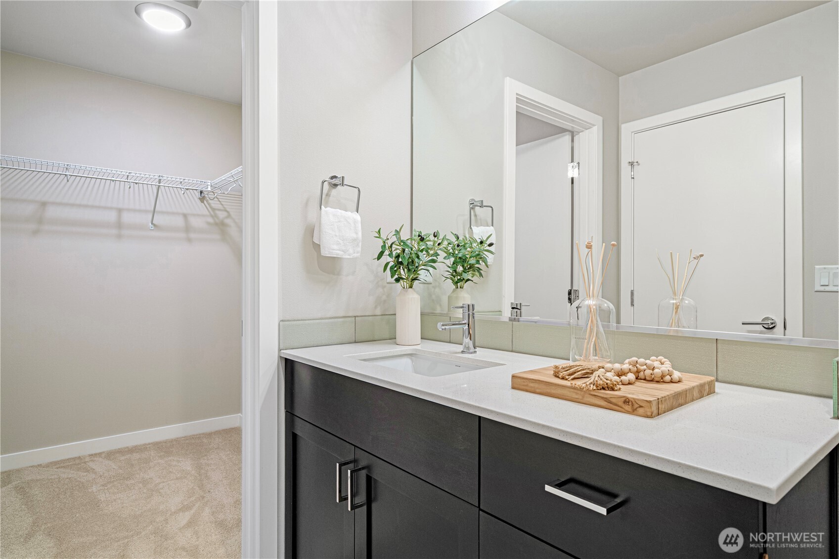 8554 22nd Place Northeast Seattle, WA 98115 - Photo 25 of 35 a bathroom with a sink and a mirror