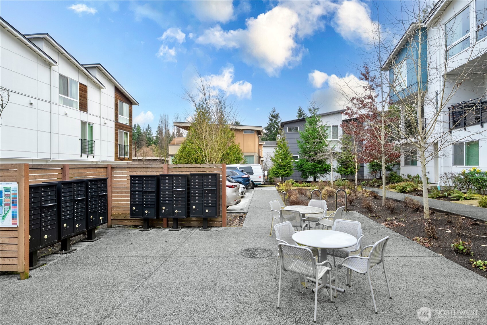 8554 22nd Place Northeast Seattle, WA 98115 - Photo 28 of 35 a view of a patio with a table and chairs