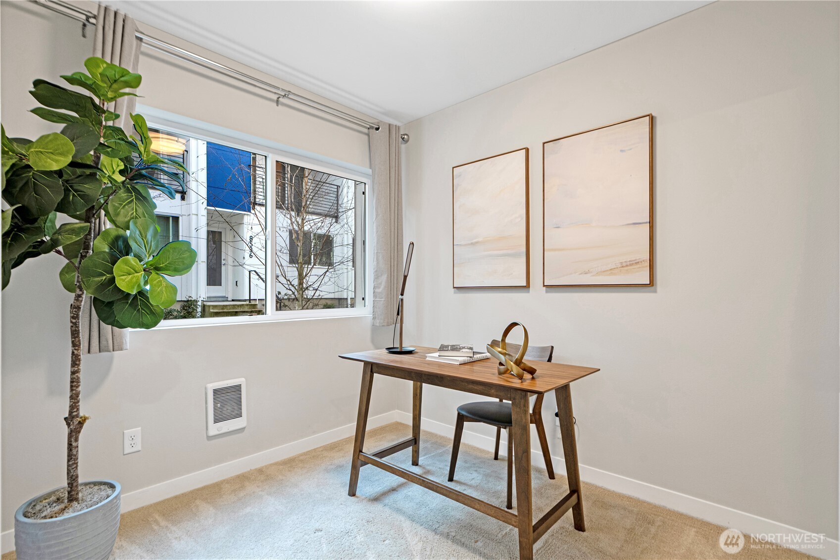 8554 22nd Place Northeast Seattle, WA 98115 - Photo 4 of 35 a work room with furniture and a potted plant