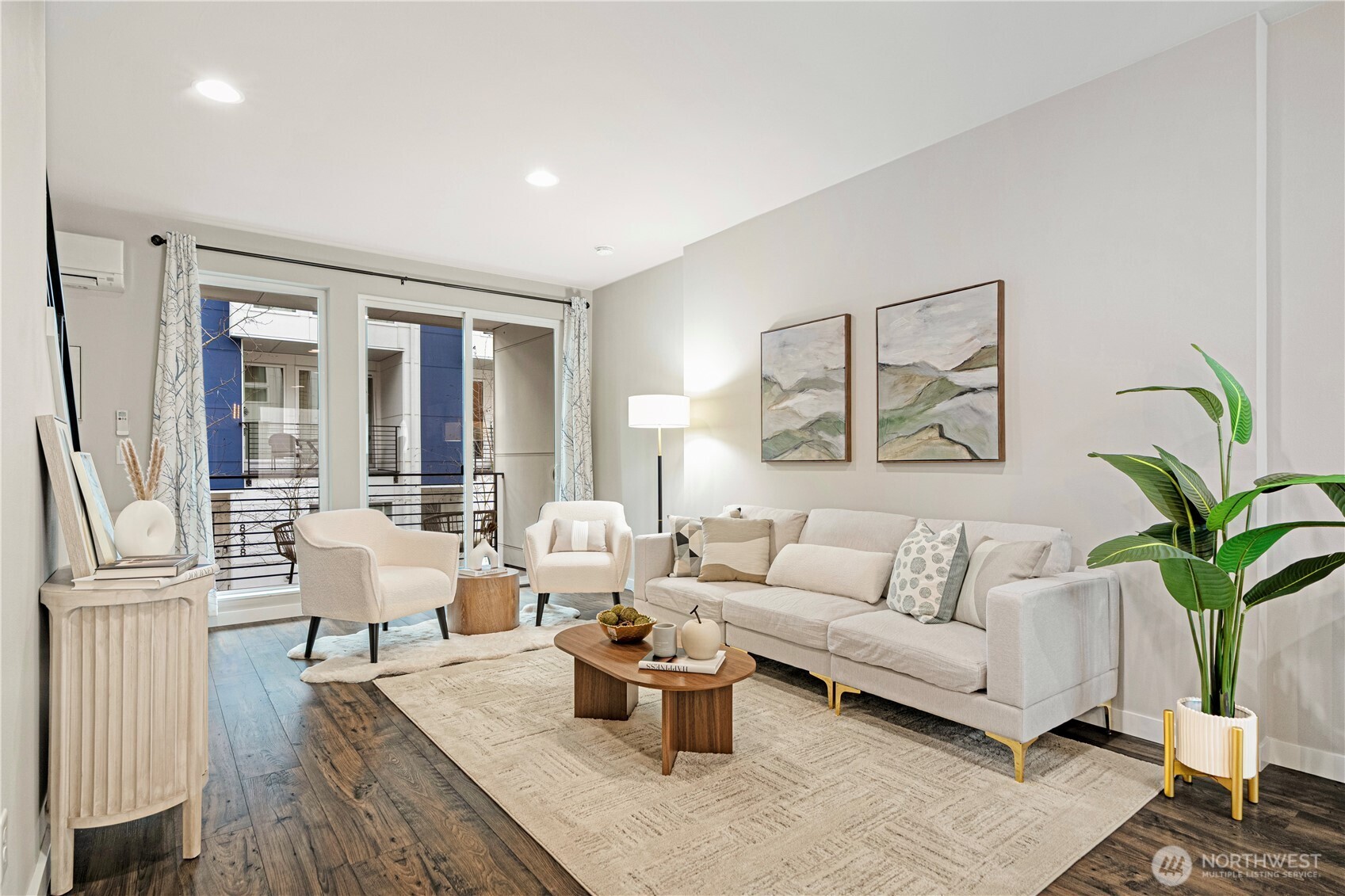 8554 22nd Place Northeast Seattle, WA 98115 - Photo 7 of 35 a living room with furniture and a potted plant