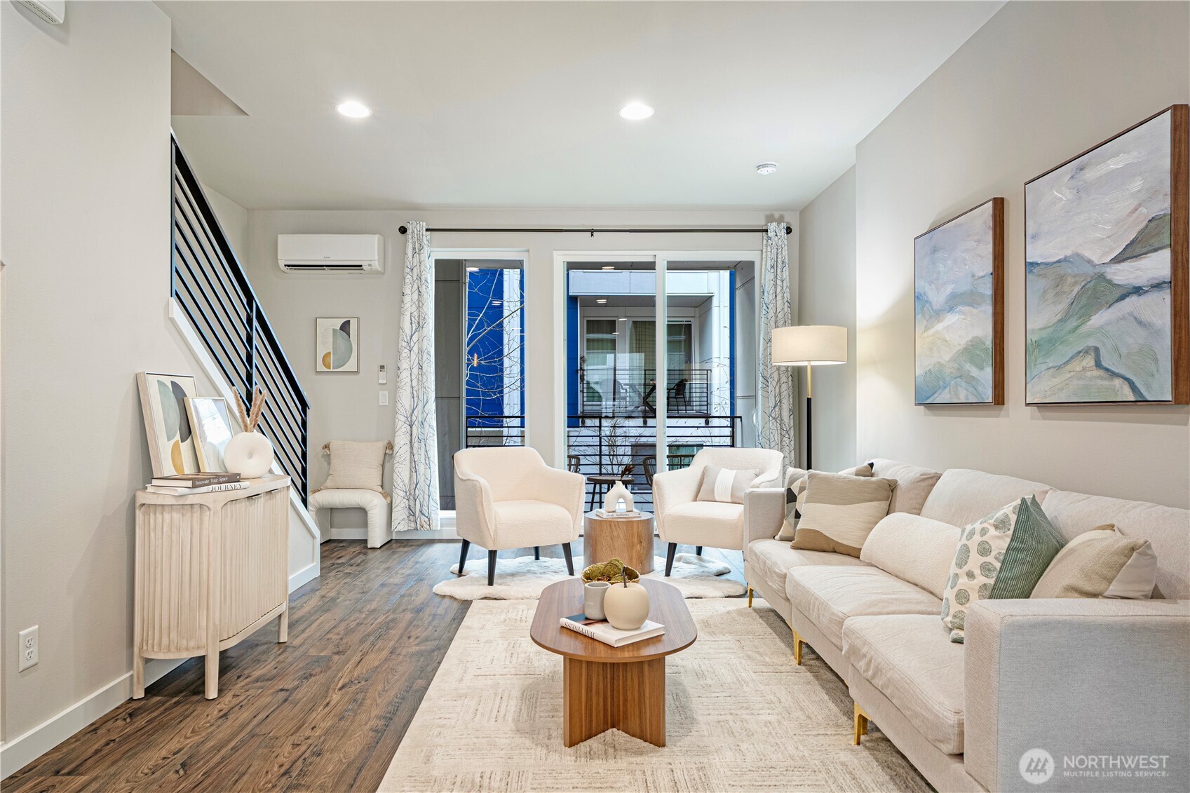 8554 22nd Place Northeast Seattle, WA 98115 - Photo 8 of 35 a living room with furniture and a large window