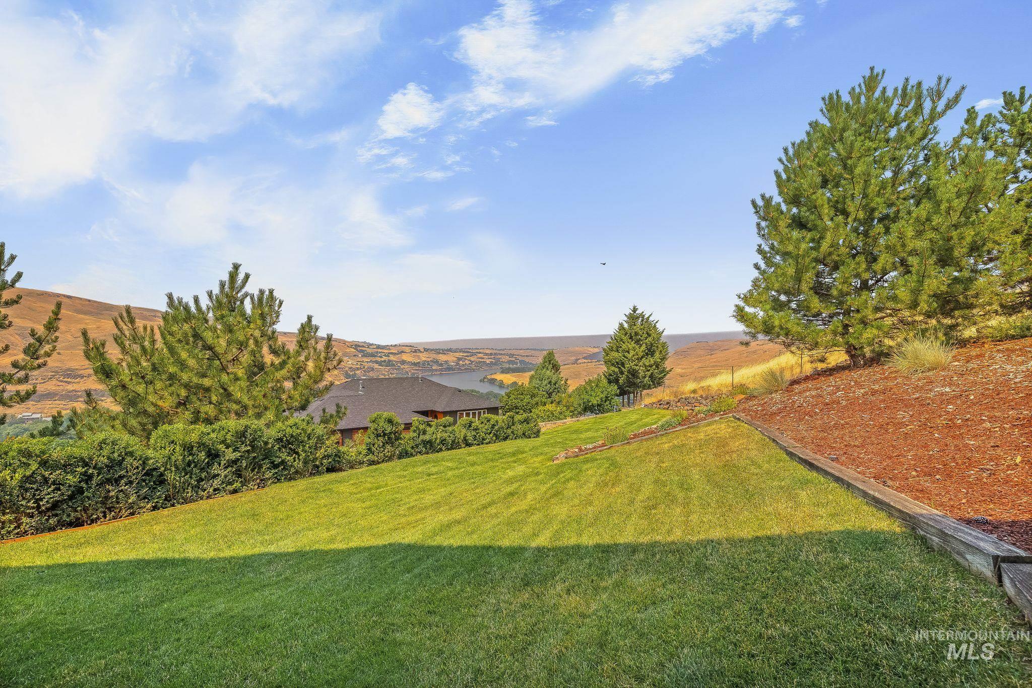 602 Quarry Road Asotin, WA 99402 - Photo 43 of 49 Two-story home with a multi-level deck and a lower-level patio