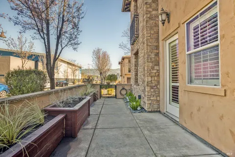 a view of balcony with furniture