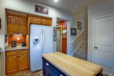 a view of a kitchen from the hallway