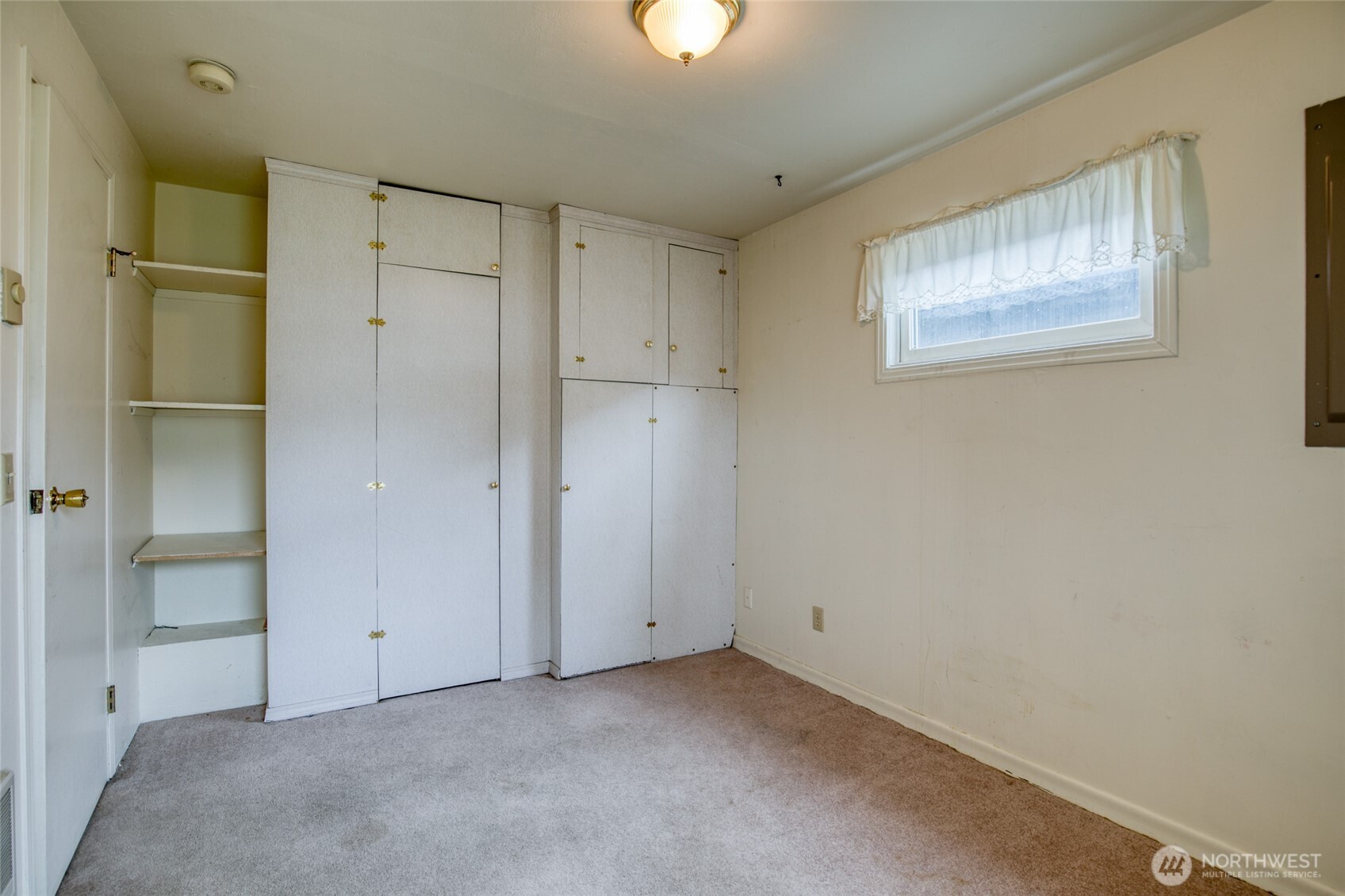 1019 Maple Street Hoquiam, WA 98550 - Photo 12 of 21 a view of an empty room with a window