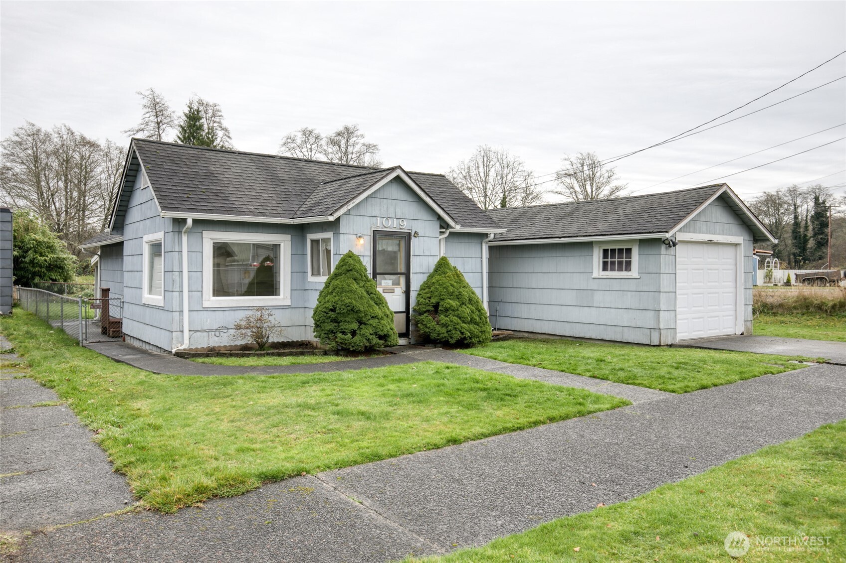 1019 Maple Street Hoquiam, WA 98550 - Photo 19 of 21 a view of a house with a backyard