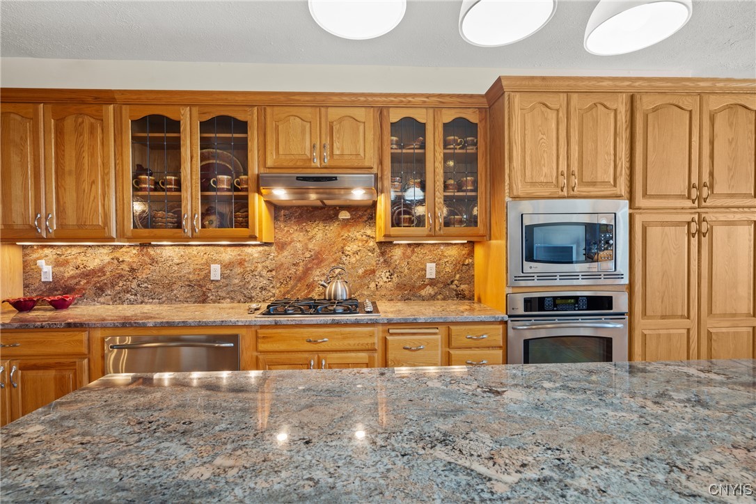 235 Highway 49 Constantia, NY 13042 - Photo 20 of 46 Under-cabinet lighting and access to numerous elec