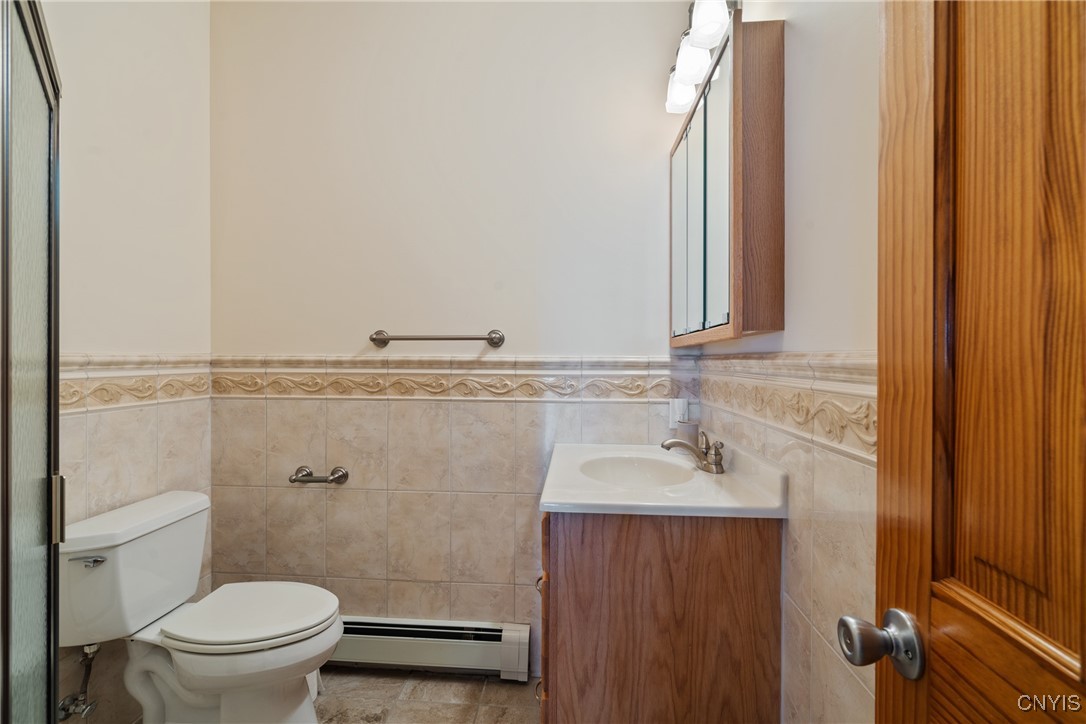 235 Highway 49 Constantia, NY 13042 - Photo 29 of 46 Just past the kitchen is a short hallway towards t