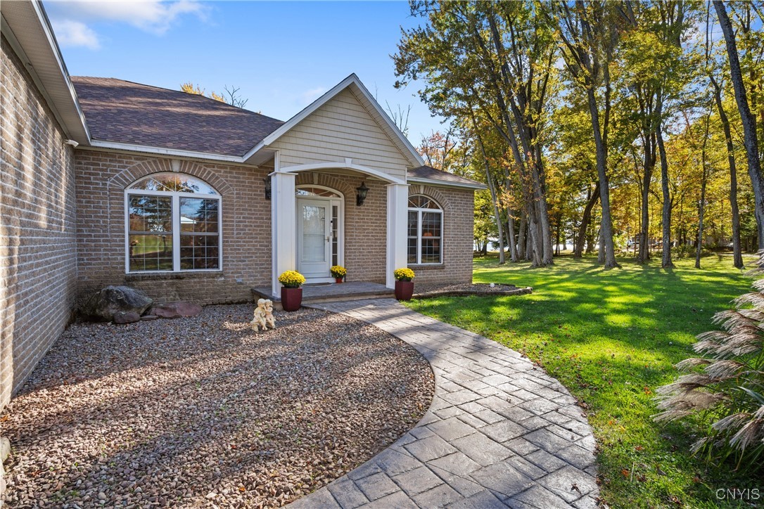 235 Highway 49 Constantia, NY 13042 - Photo 3 of 46 The stamped concrete walkway is both beautiful and