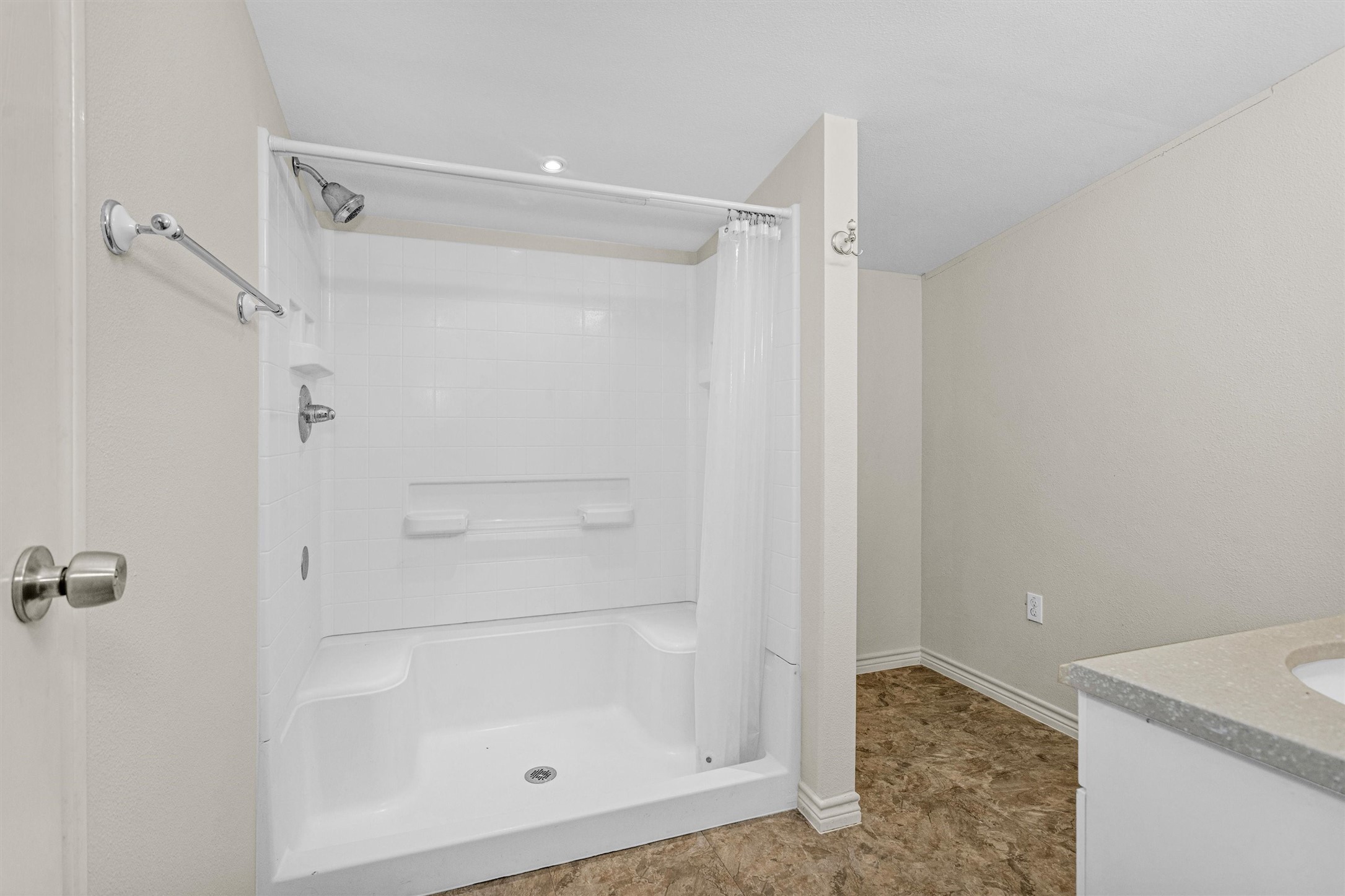 99 Main Street Huntsville, TX 77340 - Photo 26 of 47 Ensuite bathroom features a walk-in shower.