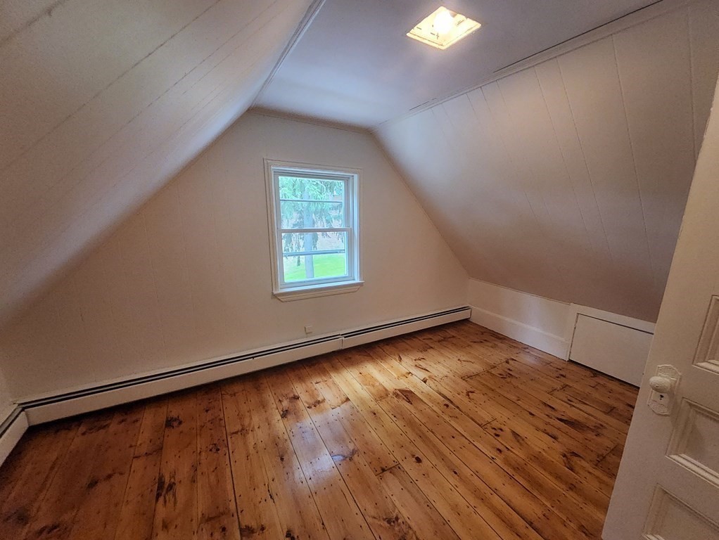2 Grove Street Methuen, MA 01844 - Photo 10 of 15 an empty room with wooden floor and windows