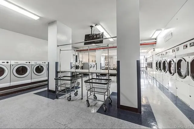 a view of kitchen and utility room with stairs