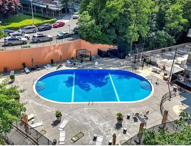 a view of swimming pool outdoor seating