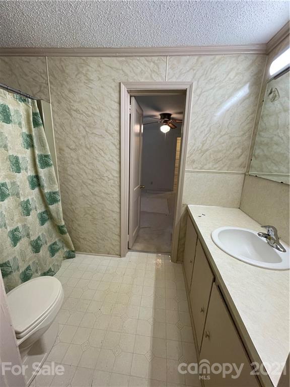 1541 Hardin Strait Road Chester, SC 29706 - Photo 8 of 16 a bathroom with a sink a toilet and shower