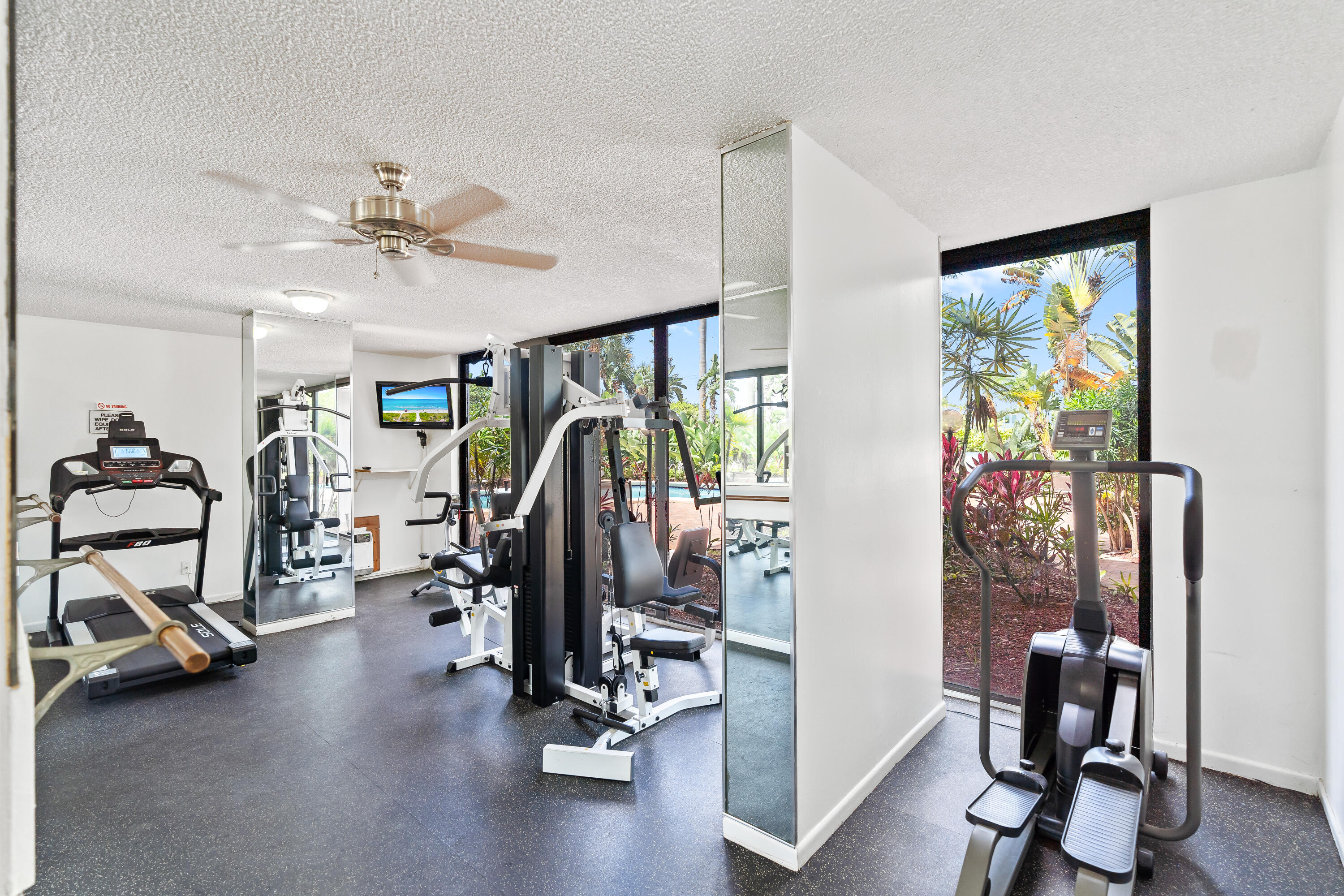 23200 Camino Del Mar, Unit 603 Boca Raton, FL 33433 - Photo 41 of 43 a view of a room with gym equipment