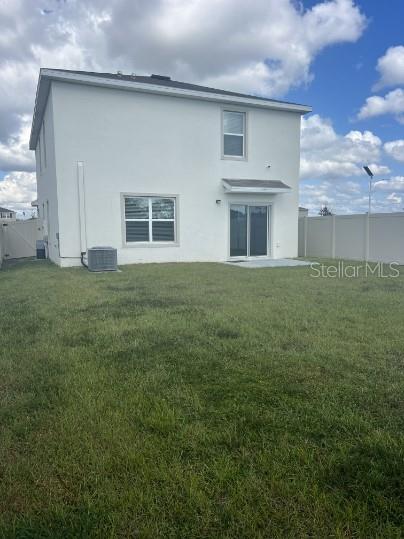 31284 Penny Surf Loop Wesley Chapel, FL 33545 - Photo 14 of 15 a house view with a garden space