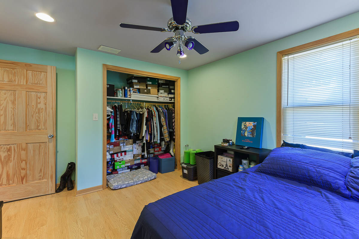 2544 East 91st Street Chicago, IL 60617 - Photo 23 of 37 a bed room with a bed and a window