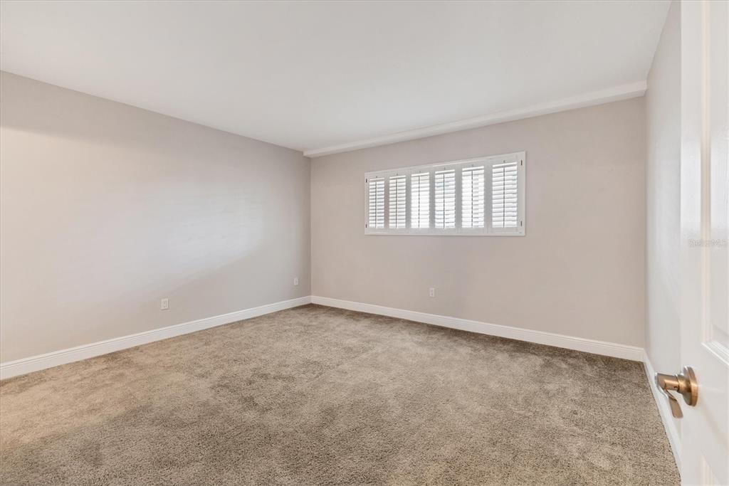 301 South Gulfstream Avenue, Unit 302 Sarasota, FL 34236 - Photo 22 of 25 an empty room with a window