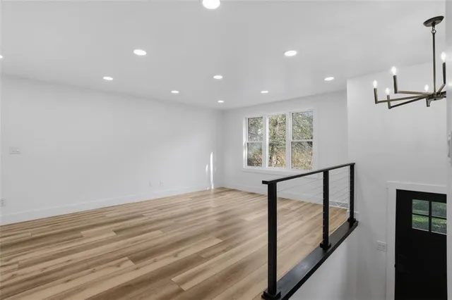 a view of an empty room with a window