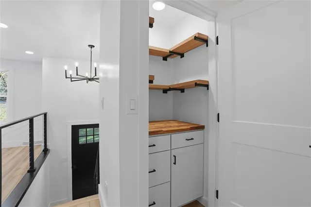 a bathroom with a window and a shower