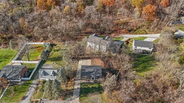 an aerial view of residential house with outdoor space