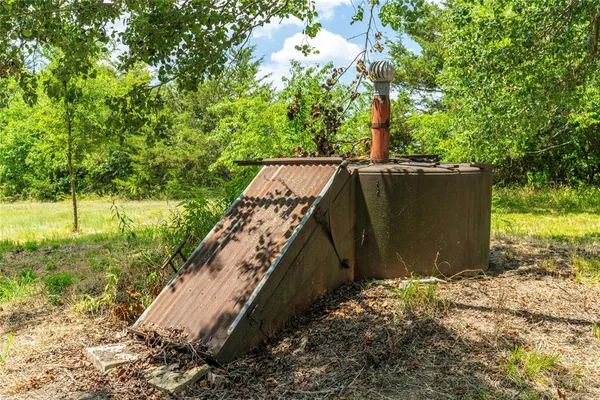 a bathroom with a sink and a window