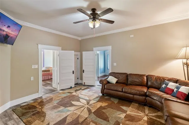 a living room with furniture and a rug