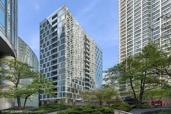 a view of a building with a street