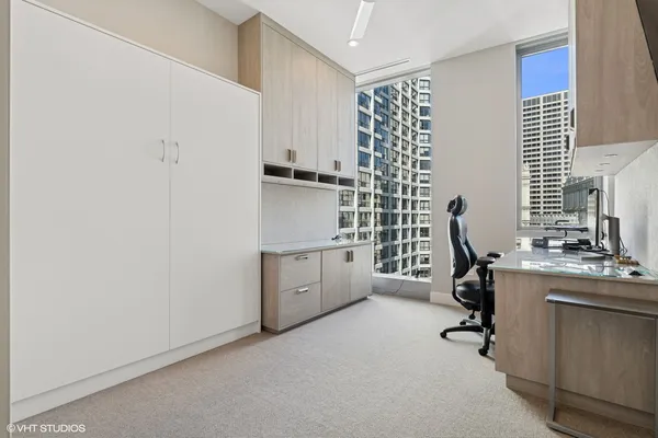 a view of workspace with windows tv cabinet