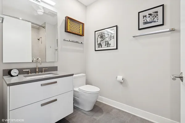 a bathroom with a sink and mirror