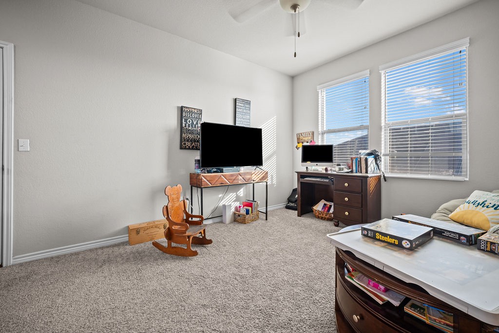 1021 Pasadena Street Portland, TX 78374 - Photo 28 of 37 a view of a livingroom with furniture and a flat screen tv