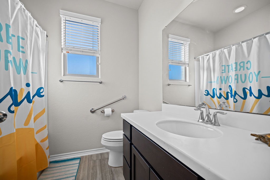 1021 Pasadena Street Portland, TX 78374 - Photo 30 of 37 a bathroom with a sink and a toilet