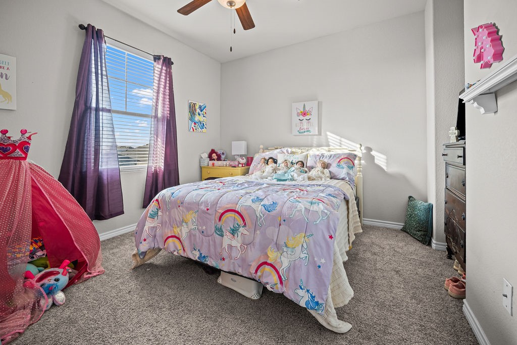 1021 Pasadena Street Portland, TX 78374 - Photo 31 of 37 a bedroom with a bed and a window