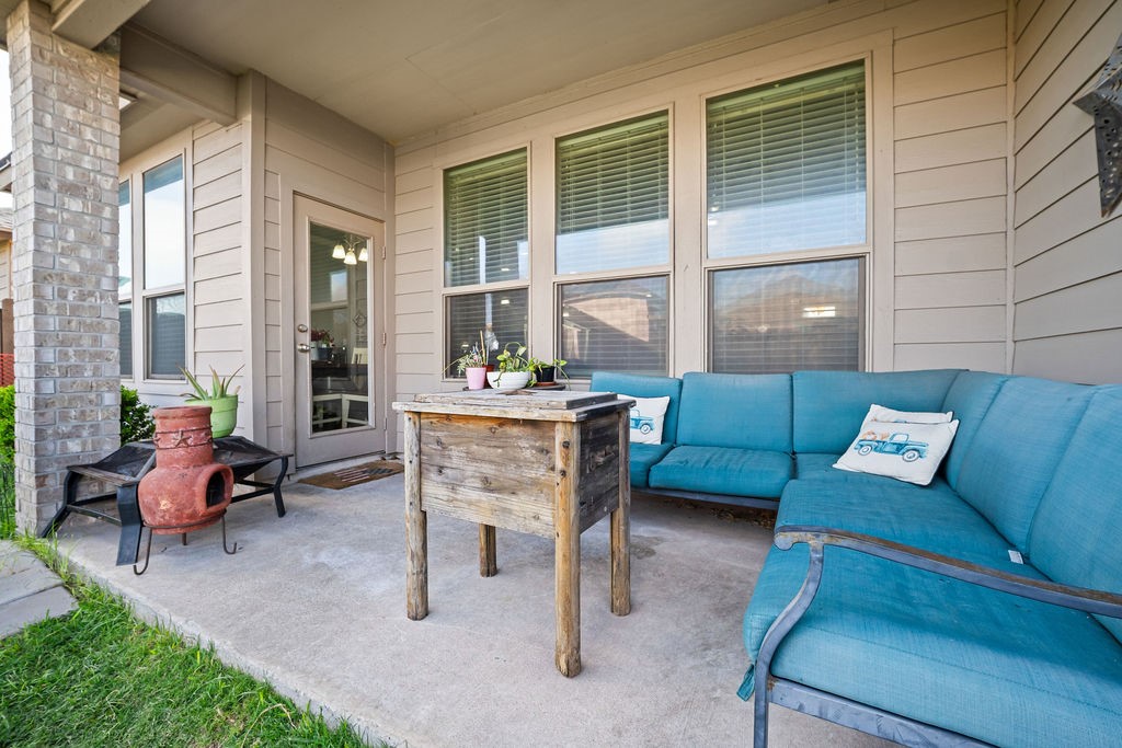 1021 Pasadena Street Portland, TX 78374 - Photo 35 of 37 a outdoor living space with furniture and a large window