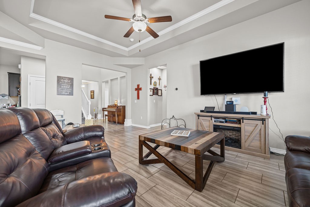 1021 Pasadena Street Portland, TX 78374 - Photo 7 of 37 a living room with furniture and a flat screen tv