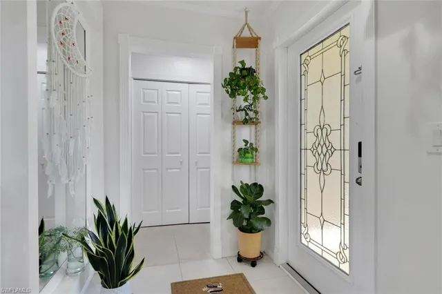 a bathroom with a toilet and a shower curtain