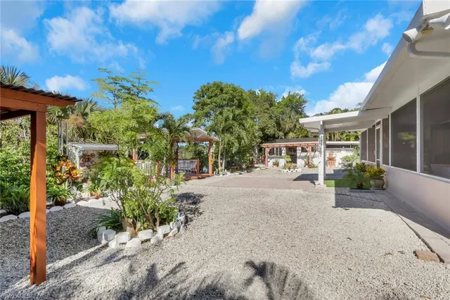a view of a car parked in back of a house