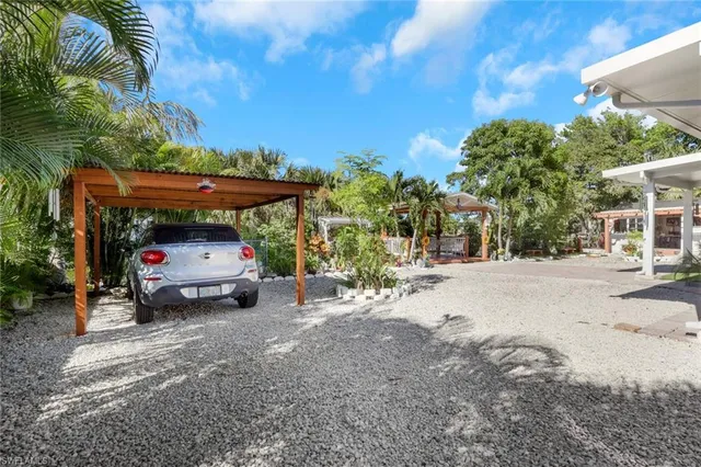 a view of a lake with a yard