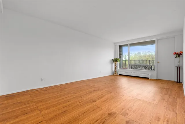 $385,000 | 90-60 Union Turnpike, Unit 9E | Forest Park