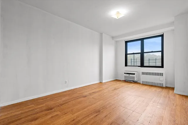 $385,000 | 90-60 Union Turnpike, Unit 9E | Forest Park