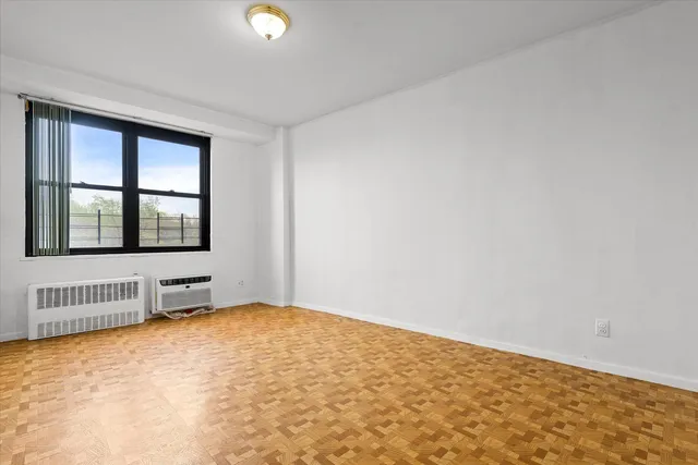 $385,000 | 90-60 Union Turnpike, Unit 9E | Forest Park