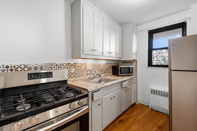 $385,000 | 90-60 Union Turnpike, Unit 9E | Forest Park