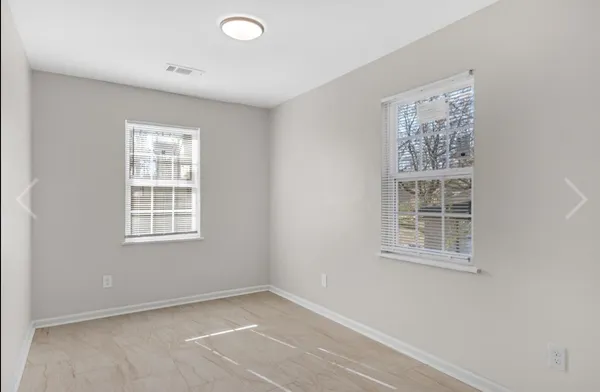 an empty room with a window