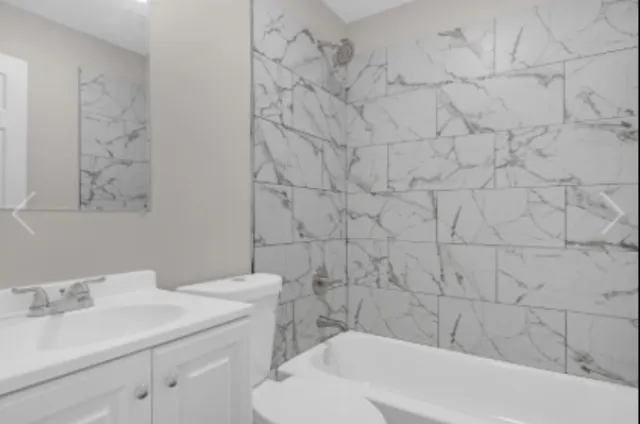 a bathroom with a sink and a toilet