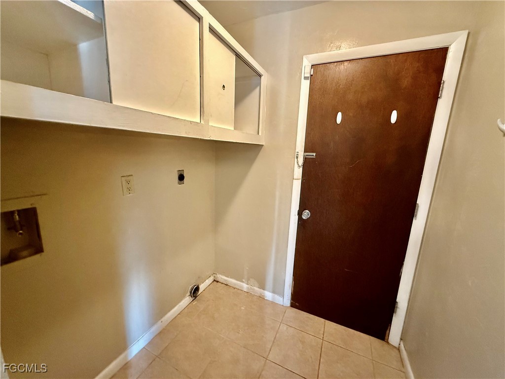 24 Clayton Avenue Lehigh Acres, FL 33936 - Photo 23 of 28 a view of door