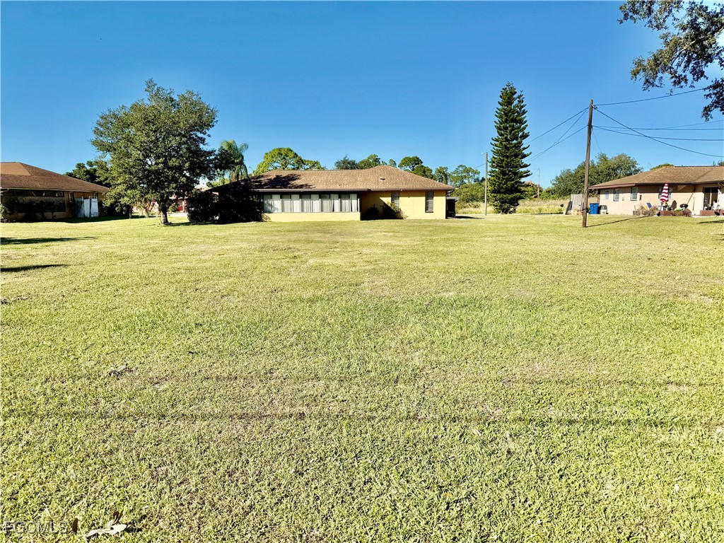 24 Clayton Avenue Lehigh Acres, FL 33936 - Photo 25 of 28 a view of an ocean view