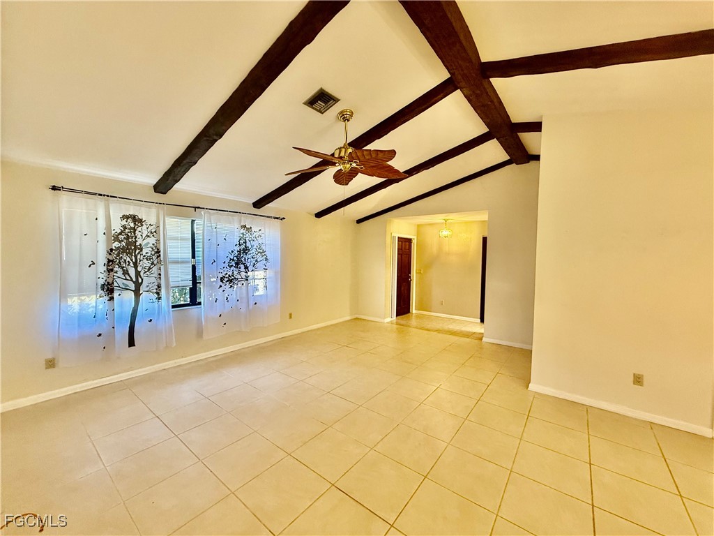 24 Clayton Avenue Lehigh Acres, FL 33936 - Photo 4 of 28 a view of a garage