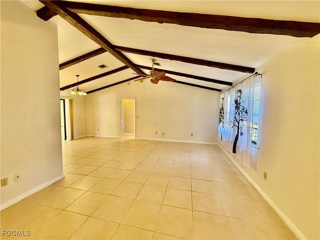 24 Clayton Avenue Lehigh Acres, FL 33936 - Photo 5 of 28 a view of a garage with painted walls