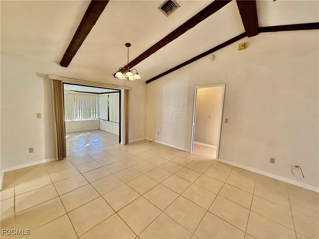 24 Clayton Avenue Lehigh Acres, FL 33936 - Photo 6 of 28 a view of an empty room