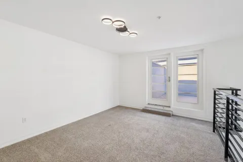 an empty room with windows